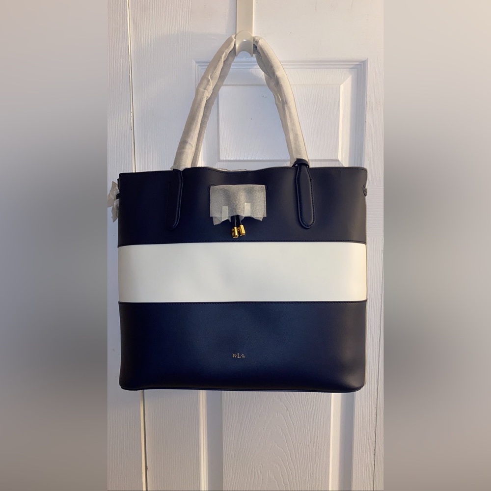 Navy blue and white with red clutch attached.